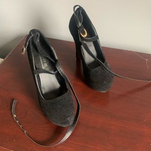 Black heels, tie up ankles, red bottoms